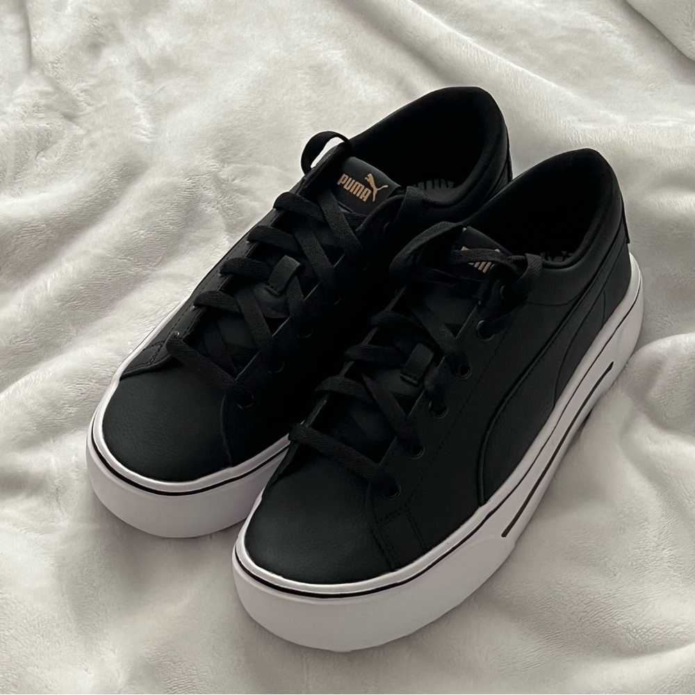 PUMA black and gold shoes for women